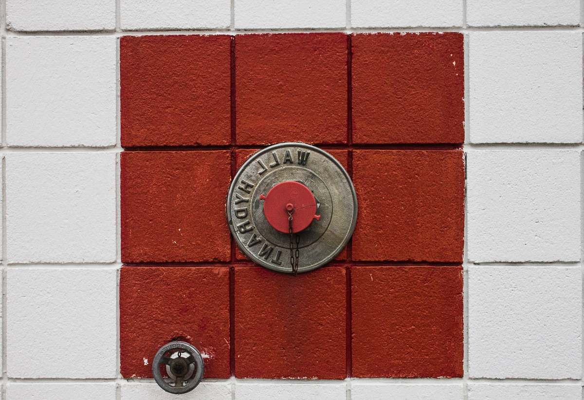 wall hydrant top view photo of drainage hole with cover handle